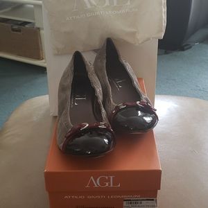 Size 41(US 10)Italian made flares by Attiluo Giust